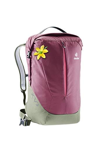 A pink and green backpack with a flower on it.