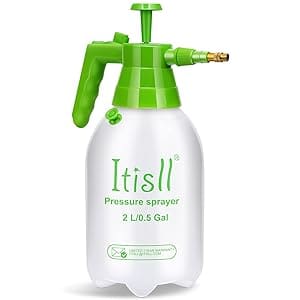 A green and white spray bottle with a handle.