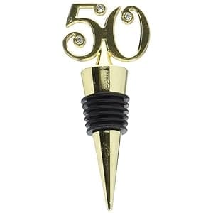 A gold bottle stopper with the number 5 0 on it.